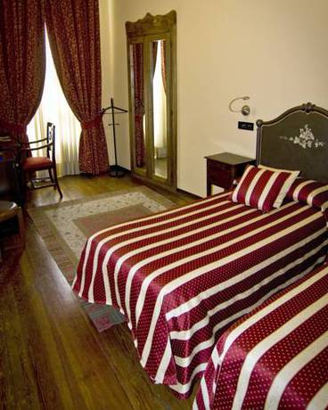 Imagen de la habitación del Hotel Regina, Pinerolo. Foto 7
