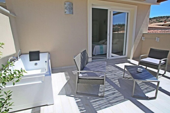 Imagen de la habitación del Hotel Regina Simius. Foto 13