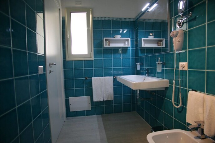 Imagen de la habitación del Hotel Regina Simius. Foto 20