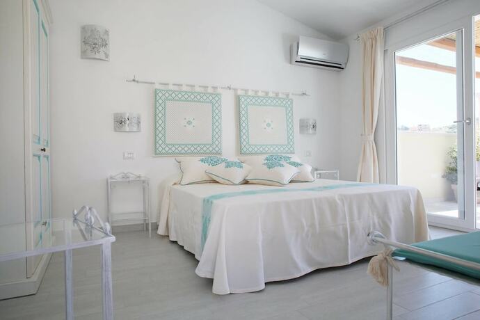 Imagen de la habitación del Hotel Regina Simius. Foto 25