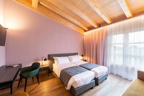 Imagen de la habitación del Hotel Regina del Garda Suite. Foto 6