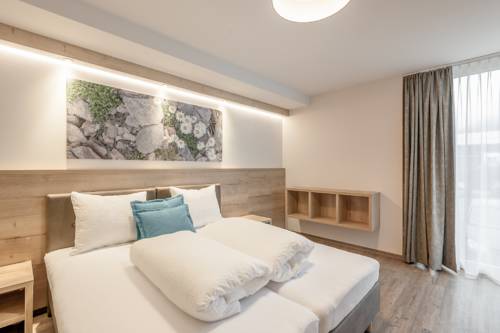 Imagen de la habitación del Hotel Regina's Alp Deluxe. Foto 16