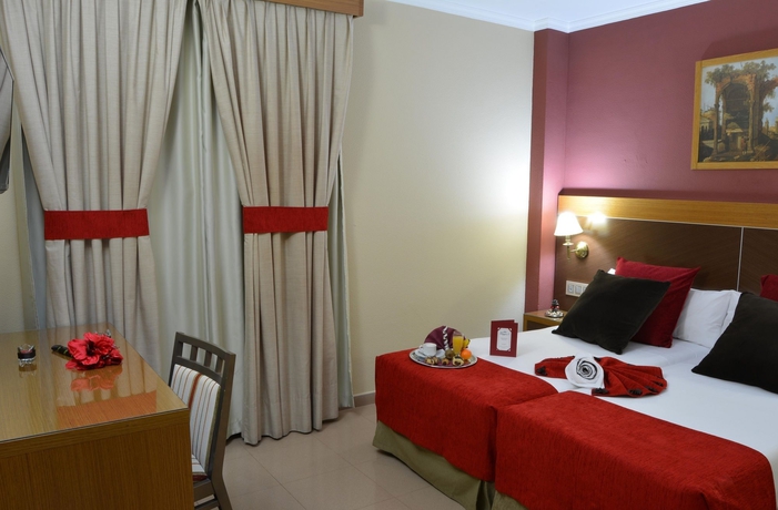 Imagen de la habitación del Hotel Regio 2. Foto 15