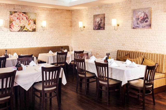 Imagen del bar/restaurante del Hotel Regnum Bansko and Thermal Pools In Banya. Foto 3