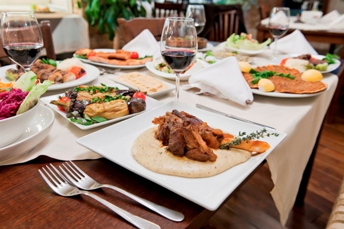 Imagen del bar/restaurante del Hotel Regnum Bansko and Thermal Pools In Banya. Foto 4