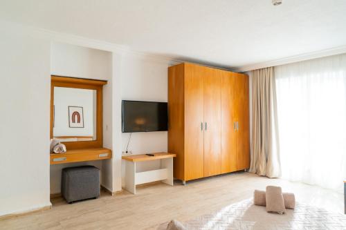 Imagen de la habitación del Hotel Regulus Beach Resort. Foto 18