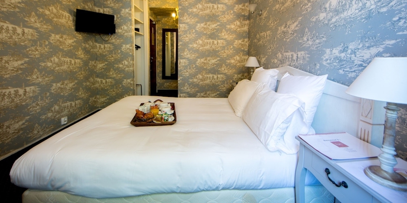 Imagen de la habitación del Hotel Regyn's Montmartre. Foto 11