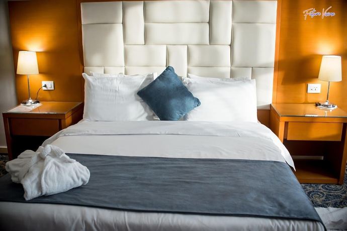 Imagen de la habitación del Hotel Rehana Plaza. Foto 10