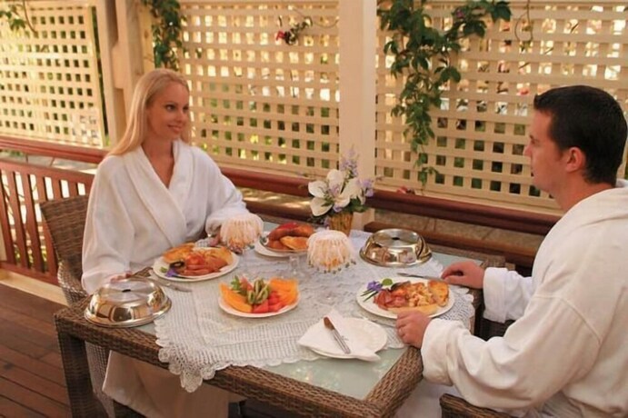 Imagen del bar/restaurante del Hotel Reid's Place. Foto 24