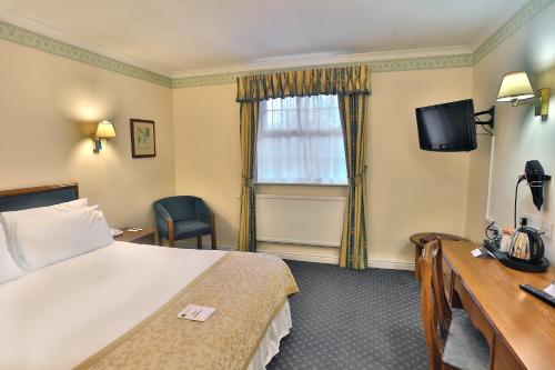 Imagen de la habitación del Hotel Reigate Manor Hotel. Foto 5