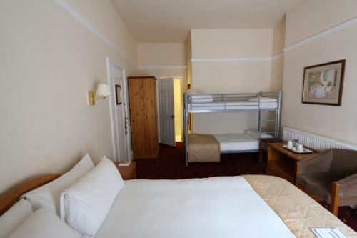 Imagen de la habitación del Hotel Reigate Manor Hotel. Foto 6