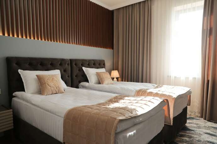 Imagen de la habitación del Hotel Reikartz Amar Samarkand. Foto 14