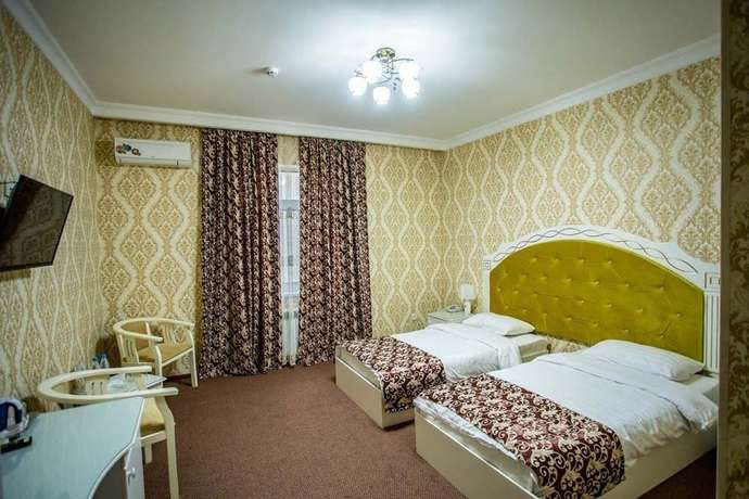 Imagen de la habitación del Hotel Reikartz Modarixon Bukhara. Foto 11