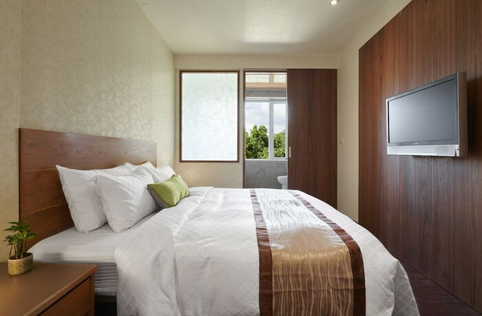 Imagen de la habitación del Hotel Reikei Hot Spring Resort, Guanziling. Foto 16