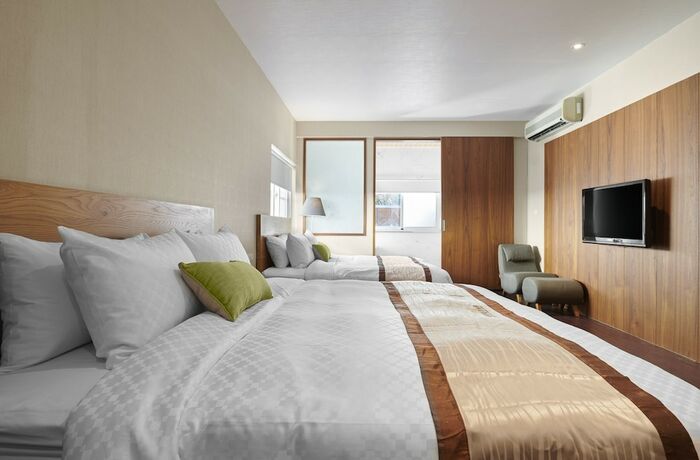 Imagen de la habitación del Hotel Reikei Hot Spring Resort, Guanziling. Foto 19