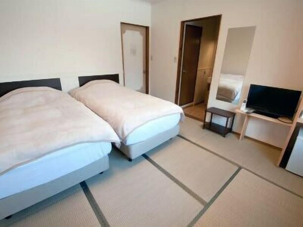 Imagen de la habitación del Hotel Reimeien. Foto 31