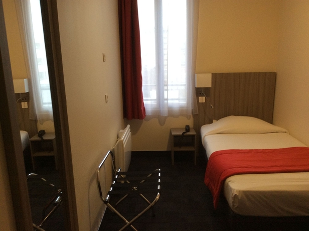 Imagen de la habitación del Hotel Reims. Foto 7