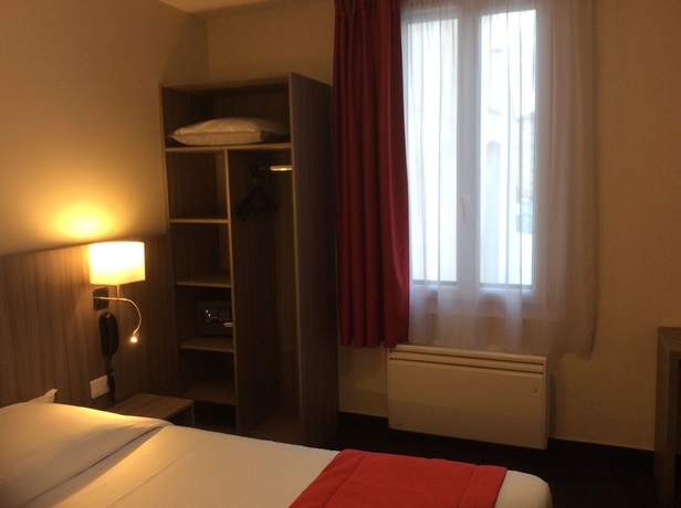 Imagen de la habitación del Hotel Reims. Foto 9