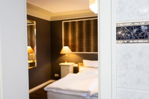 Imagen de la habitación del Hotel Rein Klassik, Bad Pyrmont. Foto 15