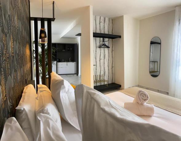 Imagen de la habitación del Hotel Reina Victoria La Plaza. Foto 10