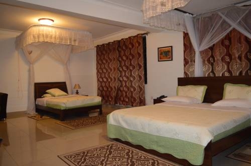 Imagen de la habitación del Hotel Reinah Tourist. Foto 7