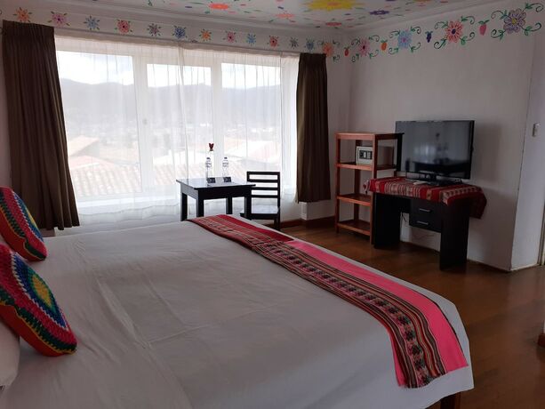 Imagen de la habitación del Hotel Reinbo Garden. Foto 17