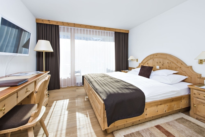 Imagen de la habitación del Hotel Relais Andchâteaux Chasa Montana. Foto 4