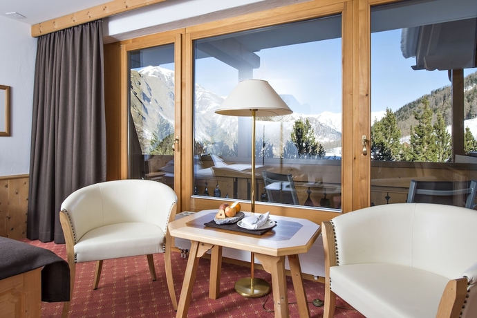 Imagen de la habitación del Hotel Relais Andchâteaux Chasa Montana. Foto 7