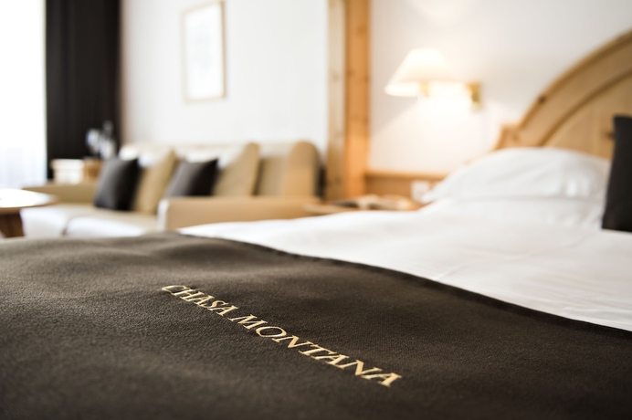 Imagen de la habitación del Hotel Relais Andchâteaux Chasa Montana. Foto 9