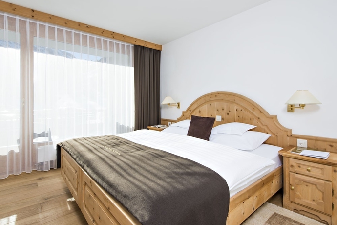 Imagen de la habitación del Hotel Relais Andchâteaux Chasa Montana. Foto 13