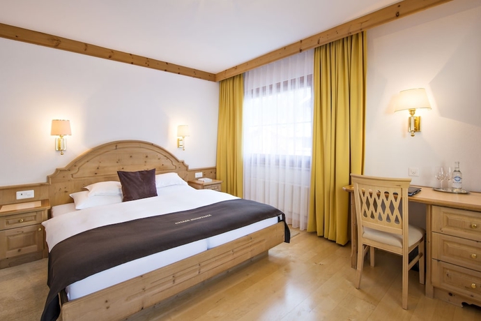 Imagen de la habitación del Hotel Relais Andchâteaux Chasa Montana. Foto 14