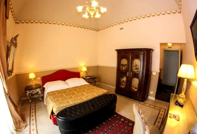 Imagen de la habitación del Hotel Relais Antica Badia - San Maurizio 1619. Foto 9