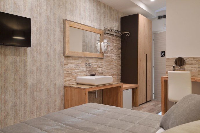 Imagen de la habitación del Hotel Relais Barberini. Foto 14