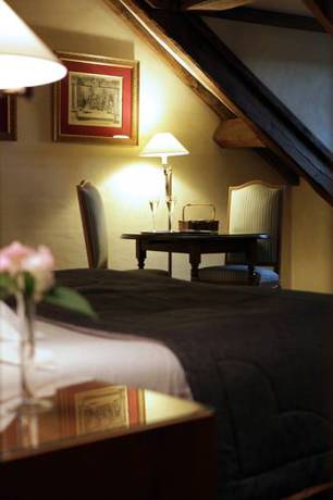 Imagen de la habitación del Hotel Relais Bernard Loiseau. Foto 9