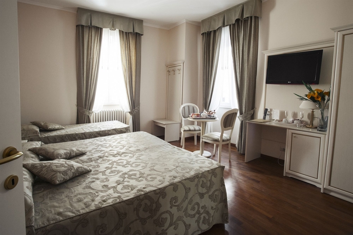 Imagen de la habitación del Hotel Relais Bocca Di Leone. Foto 5