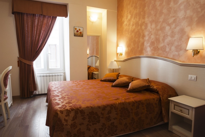 Imagen de la habitación del Hotel Relais Bocca Di Leone. Foto 7