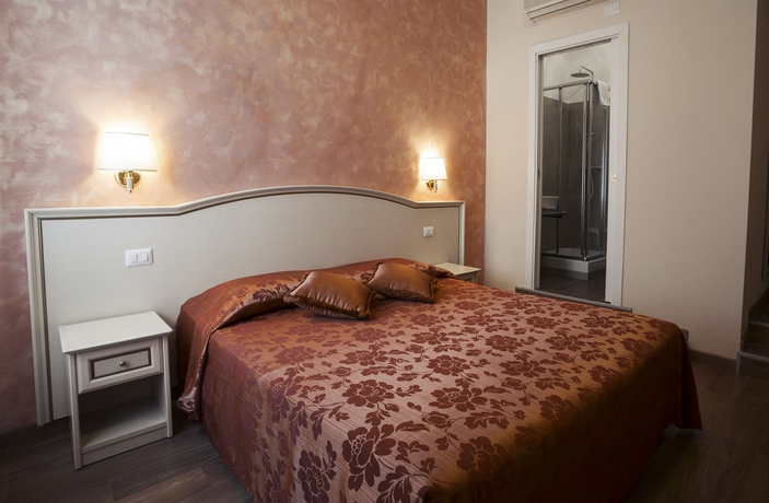 Imagen de la habitación del Hotel Relais Bocca Di Leone. Foto 8