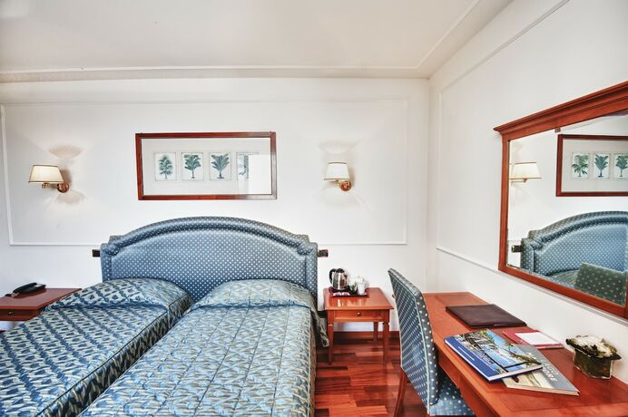 Imagen de la habitación del Hotel Relais Casali Della Cisterna. Foto 11