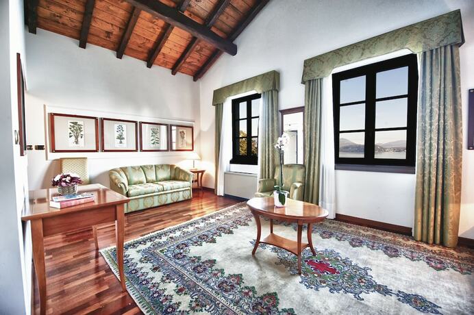Imagen de la habitación del Hotel Relais Casali Della Cisterna. Foto 20