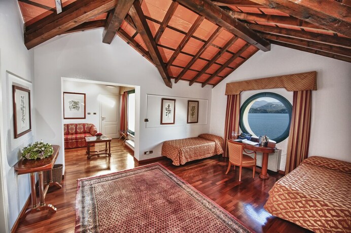 Imagen de la habitación del Hotel Relais Casali Della Cisterna. Foto 32