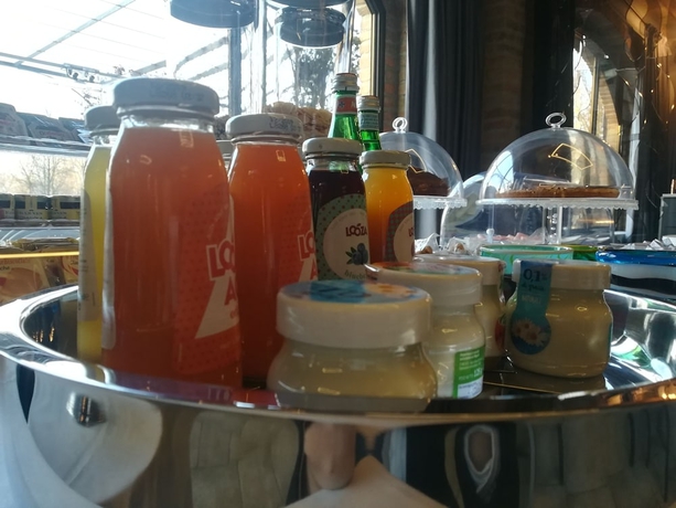 Imagen del bar/restaurante del Hotel Relais Cascina Scottina. Foto 4