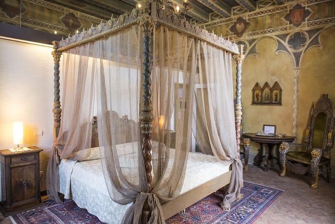 Imagen de la habitación del Hotel Relais Castello Bevilacqua. Foto 9