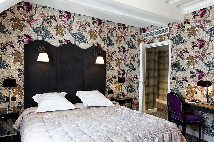 Imagen de la habitación del Hotel Relais Christine. Foto 5