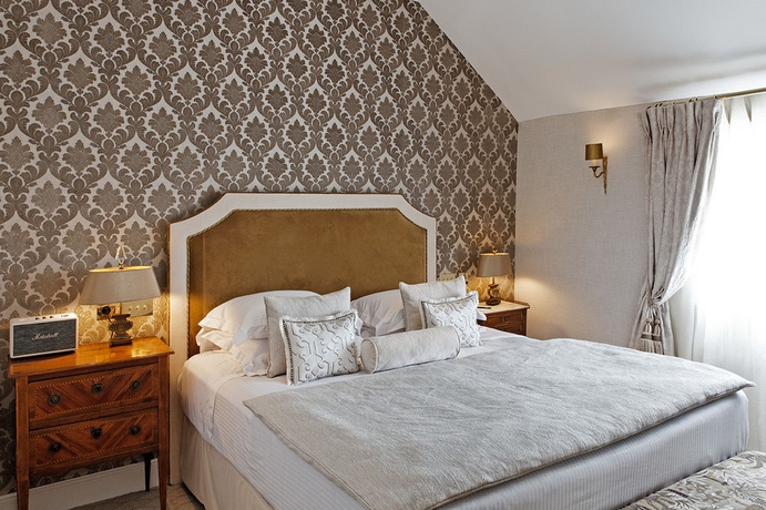 Imagen de la habitación del Hotel Relais Christine. Foto 11