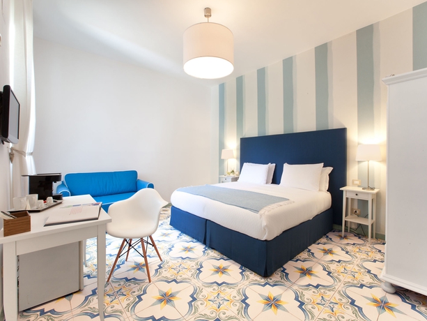 Imagen de la habitación del Hotel Relais Correale Rooms and Garden. Foto 8