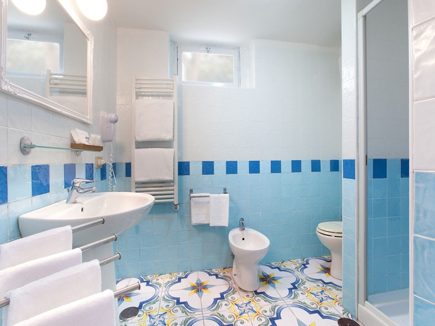 Imagen de la habitación del Hotel Relais Correale Rooms and Garden. Foto 10