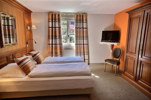 Imagen de la habitación del Hotel Relais De La Poste, La Wantzenau. Foto 13