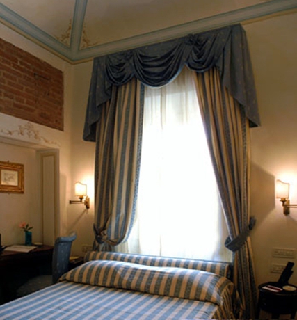 Imagen de la habitación del Hotel Relais Dell Orologio. Foto 7