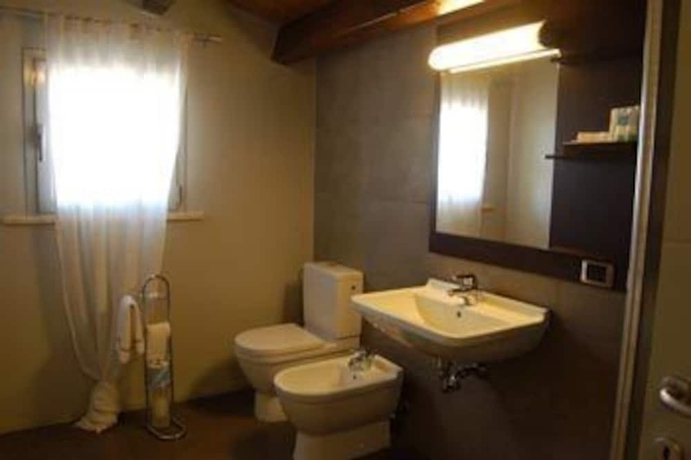 Imagen de la habitación del Hotel Relais Delle Vele. Foto 15