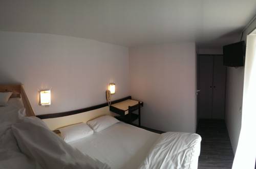 Imagen de la habitación del Hotel Relais Des 3 Pommes. Foto 7